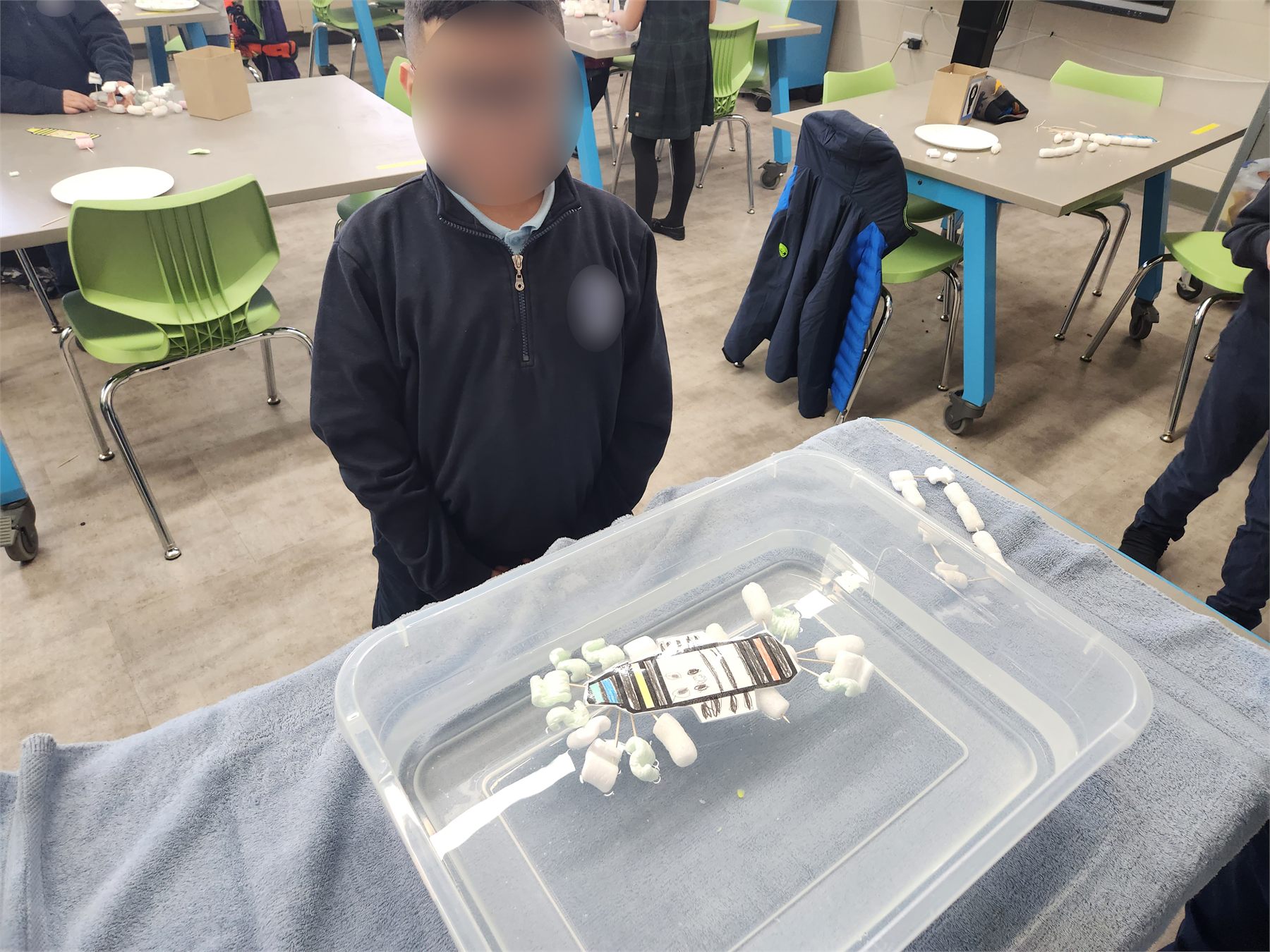 Student reacting to a successful raft test